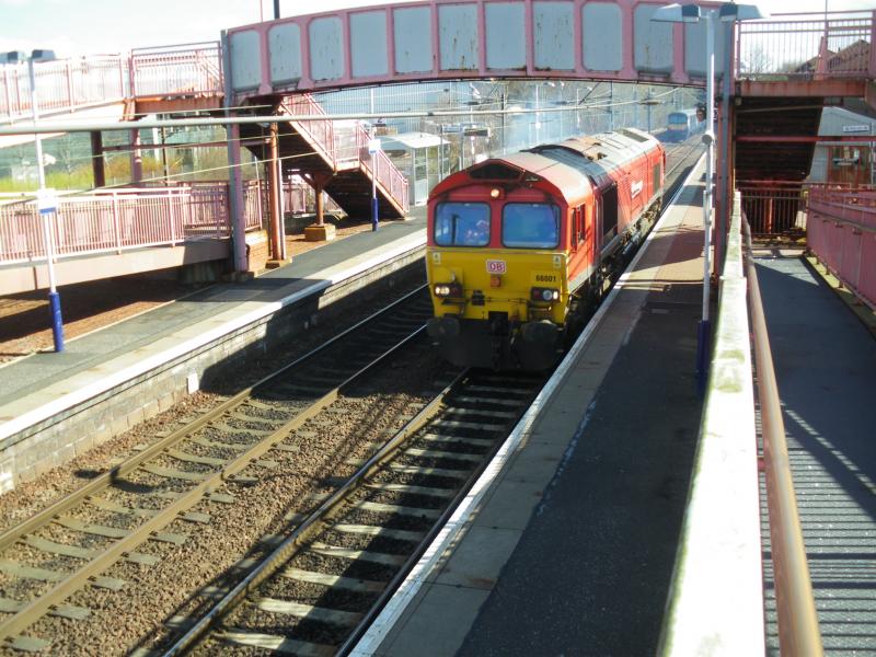 66001 First of the many: Now in DB red, 66001 runs light engine through Whifflet, from Mossend Down Yard to Grangemouth on 02Apr17 Photo of 66001 First of the many