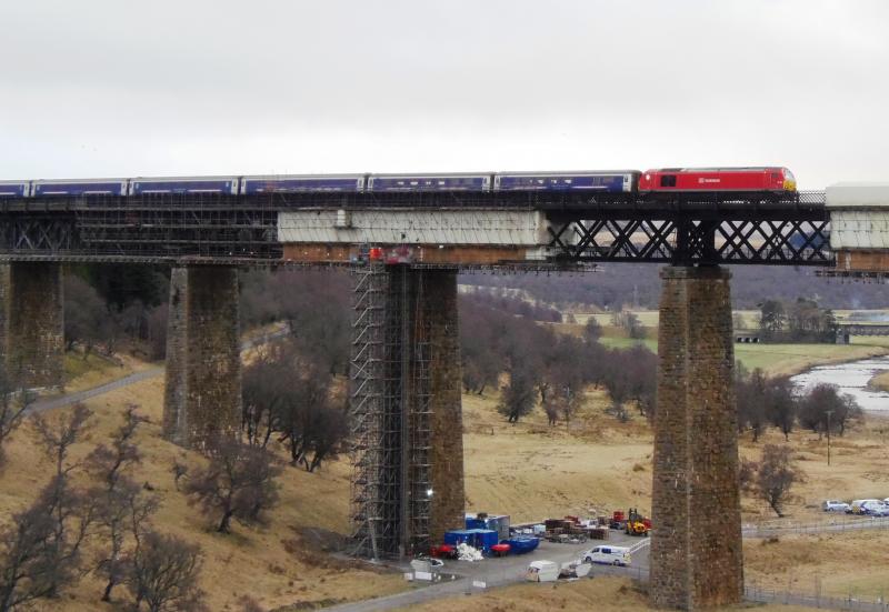 DB red on sleepers: 67013 passes over Findhorn viaduct 08 13 on 11th 04 17 Photo of DB red on sleepers