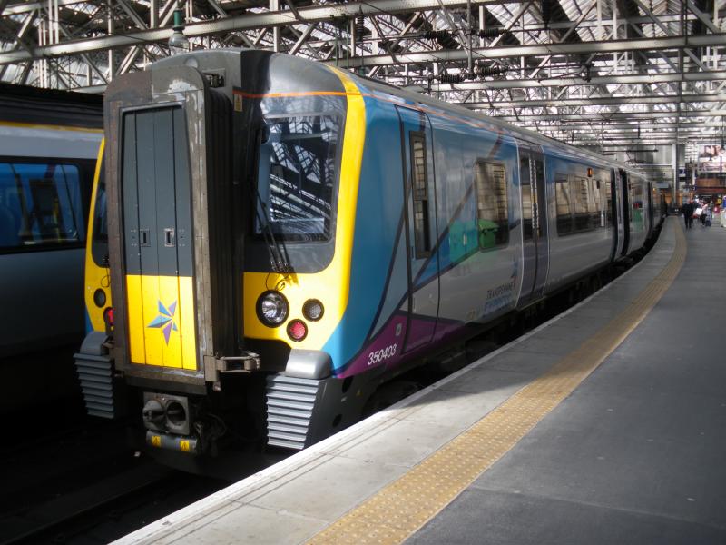 350403 Glasgow Central 24/04/17: In new TPE colours, 350403 sits in platform 2 with the 1509 to Manchester Airport Photo of 350403 Glasgow Central 24/04/17