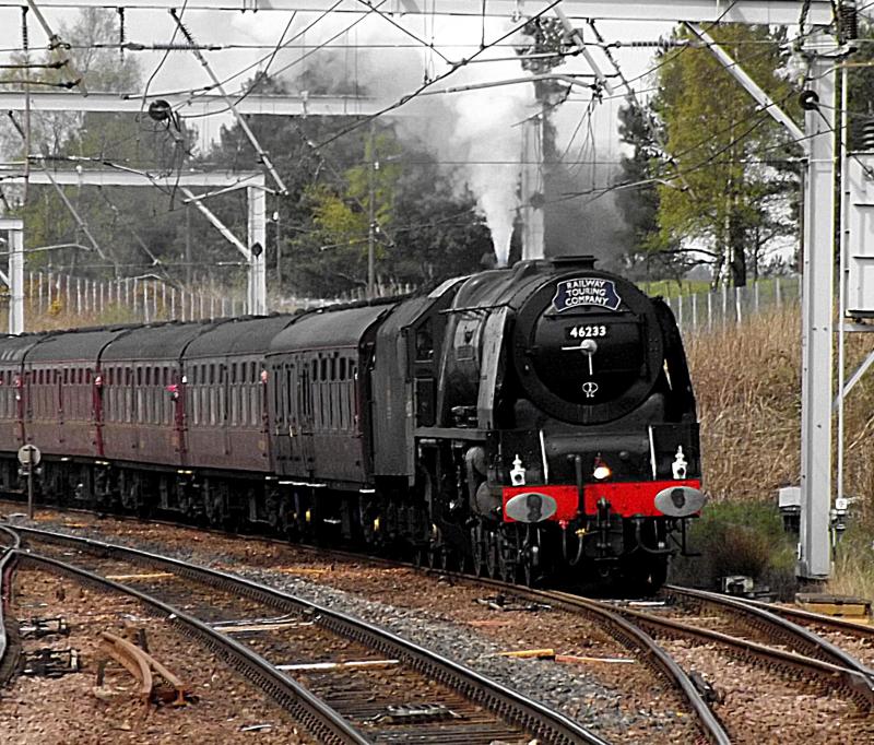 46233 on GB X at Carstairs: 46233 Duchess of Sutherland emerges from its water stop at Carstairs on Thursday 4th May 2017 Photo of 46233 on GB X at Carstairs