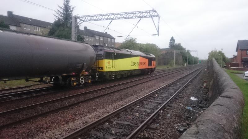 60026 Coatbridge Central: 60026 passing Coatbridge Central with a rake of tanks for Grangemouth (15.05.17). Photo of 60026 Coatbridge Central