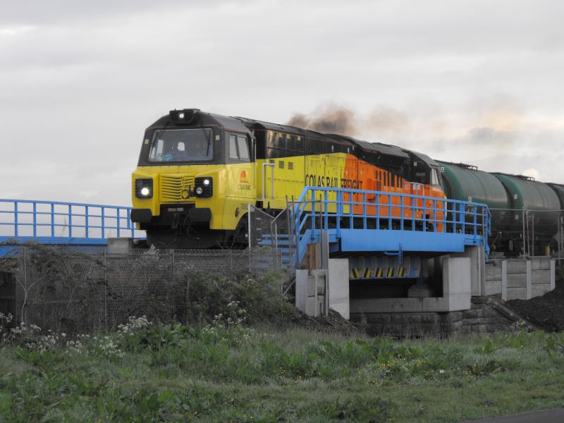 70802 on Grangemouth to Prestwick: 70802 working 6R46 Grangemouth to Prestwick on Tuesday 23rd May 2017. Seen going over the new railway bridge, near Carmuirs West at 6.45am. Photo of 70802 on Grangemouth to Prestwick