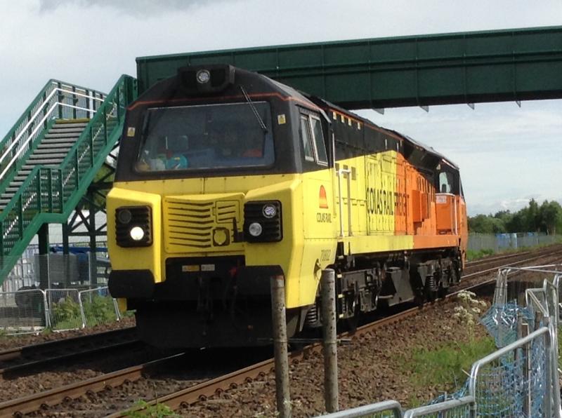 Class 70: Class 70 70802 past the construction site near Stirling heading on a rescue mission to Aberdeen on Sunday 28th May 2017 Photo of Class 70