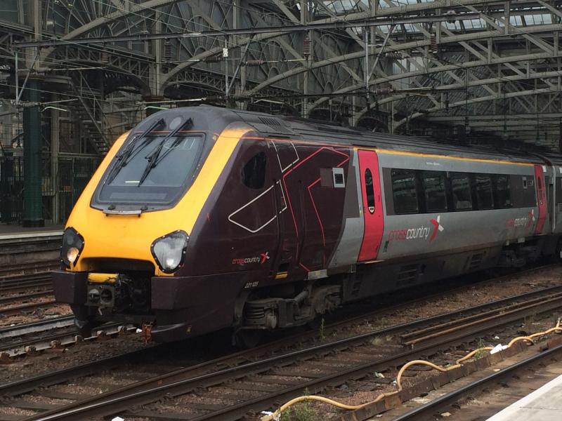 Photo of XC 221115 departing Glasgow Central