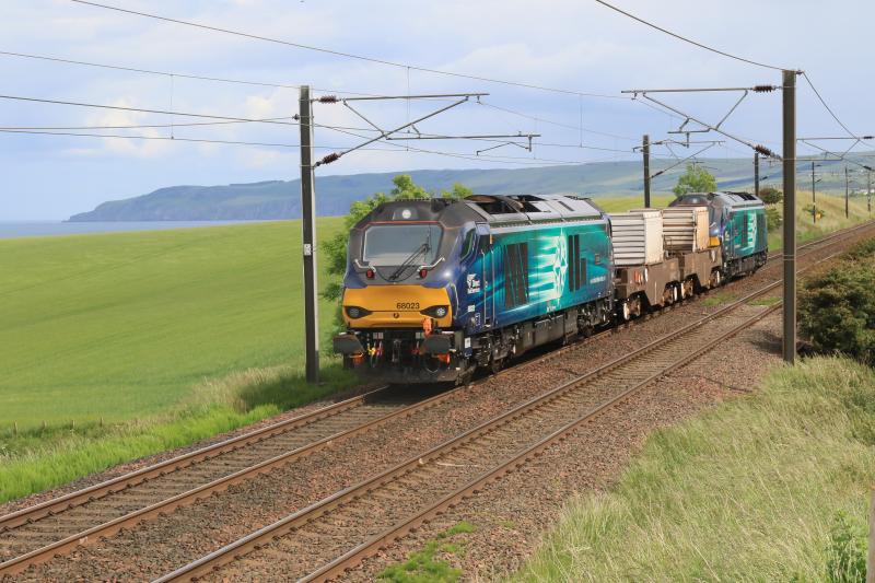 6M50: 68023 leading 6M50 15.12 Torness to Carlisle east of the Innerwick crossovers ready to reverse from the UP to the DOWN line, 68001 on the rear on 15/06/2017 Photo of 6M50
