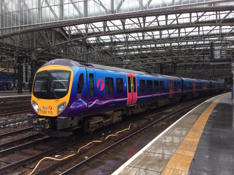 TPE 185110 departing Glasgow Central: TransPennine Express Class 185 No.185110 leaves Glasgow Central as the 1M96 11:09 service to Manchester Airport on Tuesday 4th July 2017. Photo of TPE 185110 departing Glasgow Central