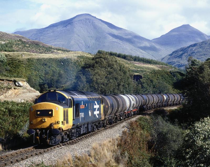 37410 Inverhaggernie 01Sep87 15.52hrs 7Y37 12.23 Mossend-Corpach.jpg: 30 years ago. A class 37 manages at least 13 tanks, West Highland Line. Photo of 37410 Inverhaggernie 01Sep87 15.52hrs 7Y37 12.23 Mossend-Corpach.jpg