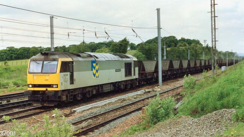 60020 7D13 Hunterston - Ravenscraig 5.6.1991: 60020 heads 7D13 Hunterston - Ravenscraig coal train south into Mossend yard on 5th June 1991 Photo of 60020 7D13 Hunterston - Ravenscraig 5.6.1991