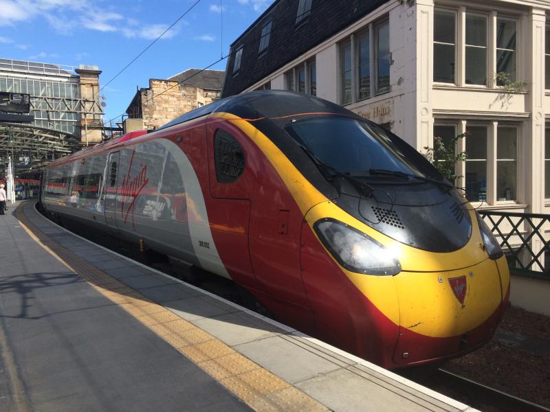 VT 390002 at Glasgow Central: Virgin Trains Class 390/0 No. 390002 'Stephen Sutton' prepares to leave Glasgow Central as the 1M12 11:40 Glasgow Central to London Euston on Tuesday 8th August 2017. Photo of VT 390002 at Glasgow Central