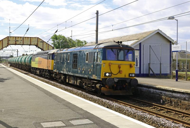 73970/56094(DIT) on 6R46 at Prestwick Town: 73970 with failed 56094 on delayed 6R46 ex Ayr station to Prestwick Airport fuel terminal-56094 failed whilst running round tanks at Ayr station. Photo of 73970/56094(DIT) on 6R46 at Prestwick Town