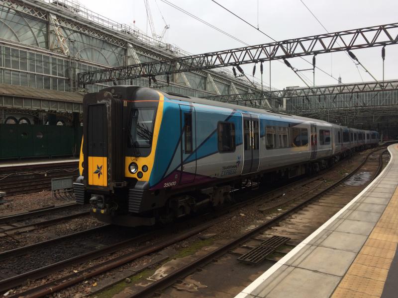 Photo of 350410 departs Glasgow Central.jpg