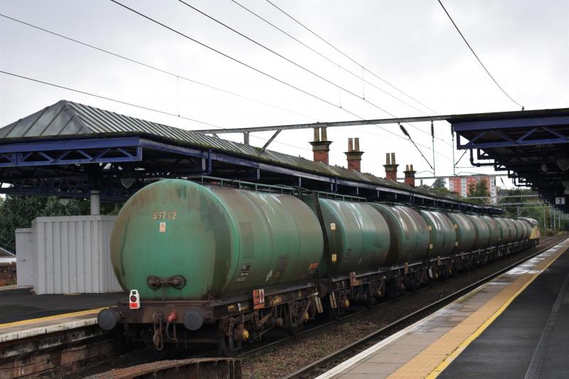Colas 56 + consist 10.9.17: Colas 56094 + 12 TTA tanks pass through Dumbarton central en route from Grangemouth-Fort William on 10.9.17 Photo of Colas 56 + consist 10.9.17