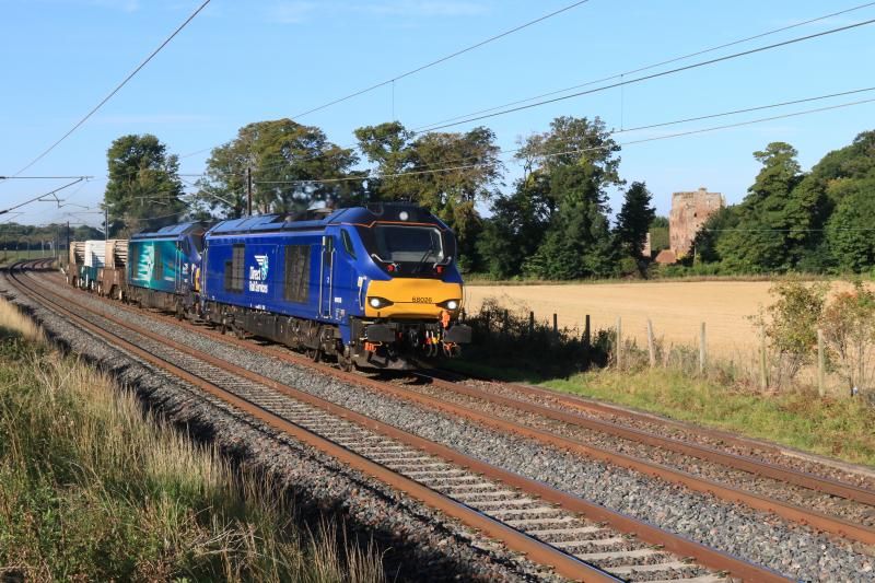 6S43: 68026 + 68017 on 6S43 06.23 Carlisle Kingmoor to Torness passing Redhouse Castle on 19/09/2017 Photo of 6S43