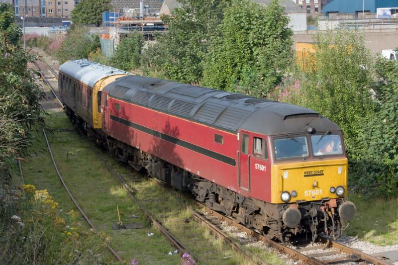 57601 & Inspection saloon 999506 at Waterloo: 57601 & Inspection saloon 999506 stand at Waterloo yard working 2Z72 Berwick - Aberdeen. Photo of 57601 & Inspection saloon 999506 at Waterloo