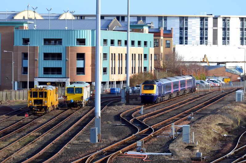 43135 & 43037 Dundee: With stoneblower DR80215 & tamper DR73804 for company, recently arrived ScotRail HST awaits its first moves on driver training runs in the DMU siding at Dundee. 29/1/2018 Photo of 43135 & 43037 Dundee