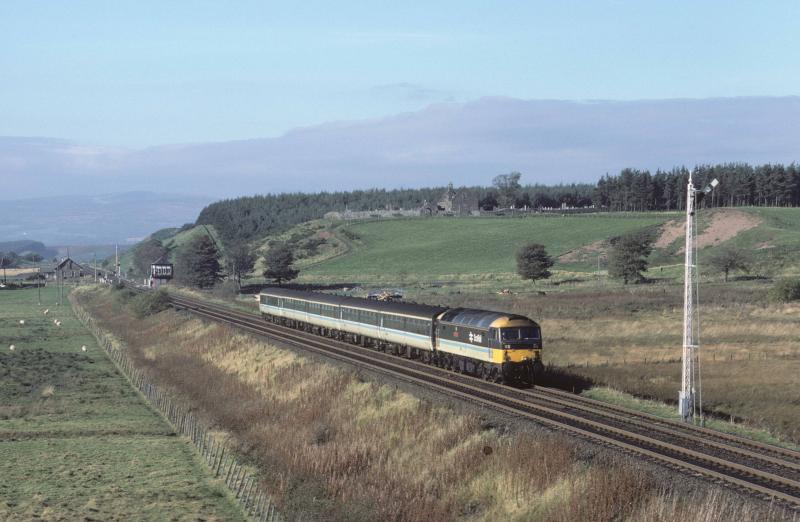 Blackford autumn: 47 701 heads the 11.25 Edinburgh to Perth past Blackford. 19/10/1985 Photo of Blackford autumn
