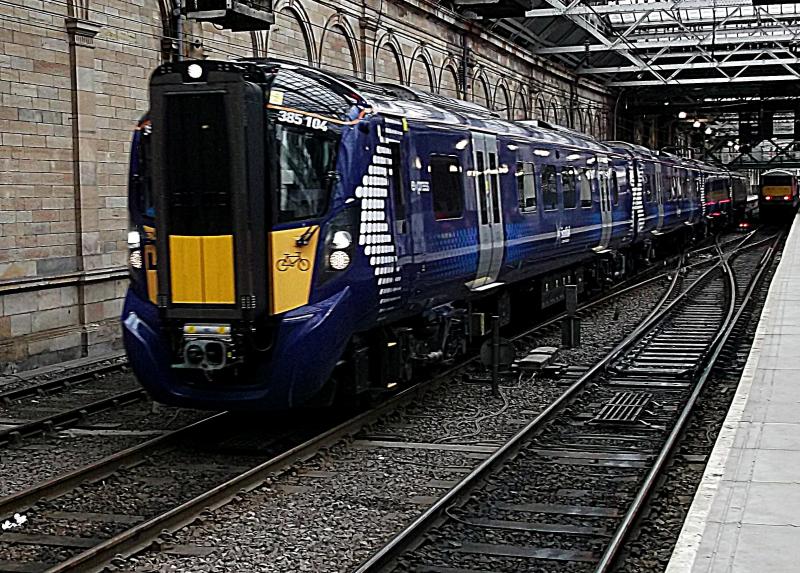 385104 at Edinburgh: Scot-Rail Hitachi 385104 departs from Edinburgh Waverley with the first of the day's mileage accumulation trains to Dunbar on Friday 16th February 2018. Photo of 385104 at Edinburgh