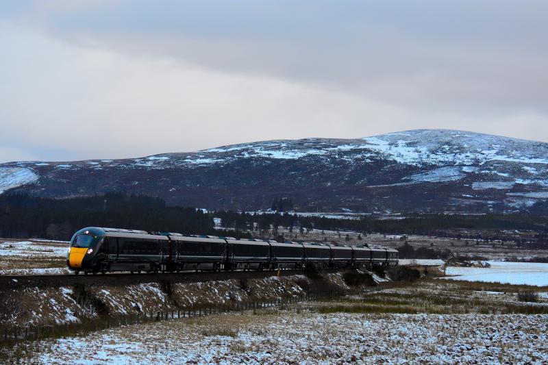 Hitachi,Class 800 Azuma.: G.W.R.liveried,Hitachi Class 800 Azuma,No. 800303 forms the 5X71 from Craigentinny to Inverness passing through the freezing cold moor at Moy. Photo of Hitachi,Class 800 Azuma.