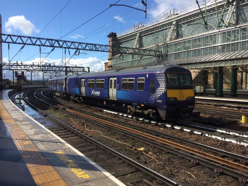 320413 at Glasgow Central: 320413 departs Glasgow Central with the 2N32 11:05 service to Neilston on Thursday 26th April 2018. Photo of 320413 at Glasgow Central