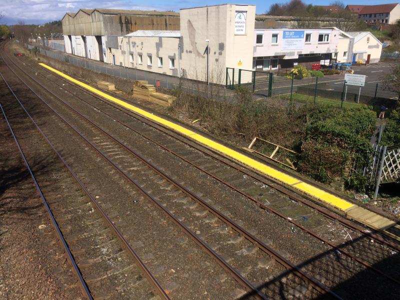 Up siding walkway at Arbroath: Network rail men appear to be laying a wooden walkway alongside the up siding in Arbroath. Photo of Up siding walkway at Arbroath