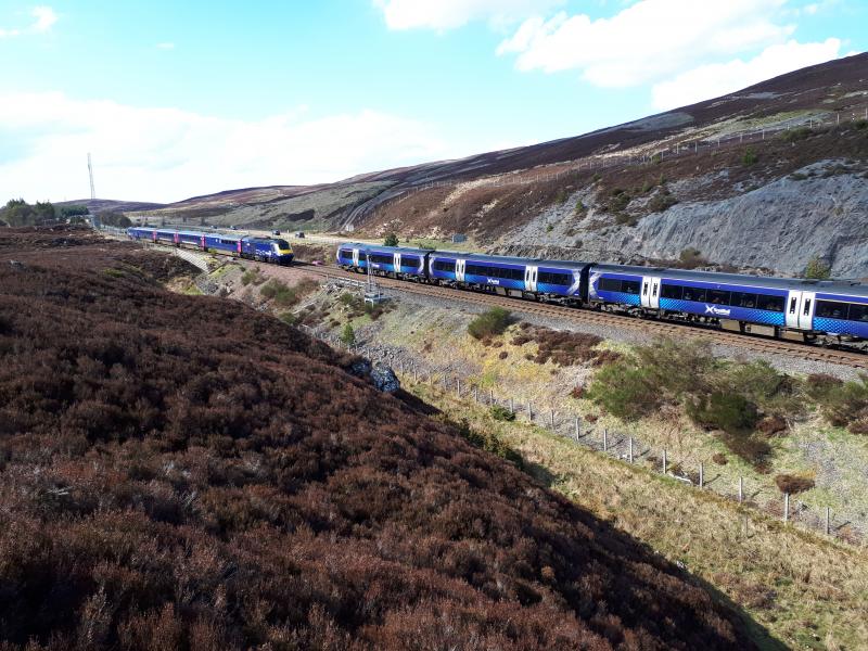 HST Training Old meets New: 2W62 on HST training run Inverness - Perth, seen at Slochd loop 07-05-18 passing late running unit Photo of HST Training Old meets New