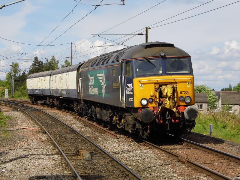 57303 Newcraighall: 5M59 1300 Mossend- Loughborough hauling translator vehicles ADB975864 ADB975867 for scrapping Photo of 57303 Newcraighall