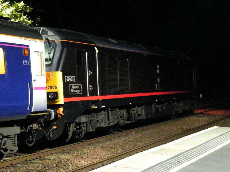 67005 @ Gleneagles - 19 May 2018: 12 minutes to midnight and the DB Schenker engine gently pulls the London bound sleeper out of the station's bright lights, into pitch darkness Photo of 67005 @ Gleneagles - 19 May 2018