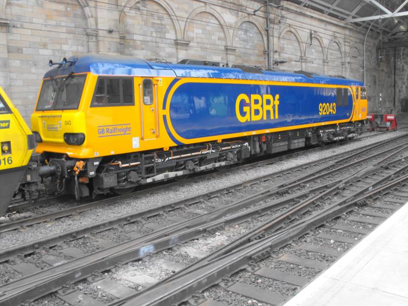 92043 in Edinburgh Waverley yesterday: 92043 taken in Edinburgh Waverley on Saturday 26th May 2018. Photo of 92043 in Edinburgh Waverley yesterday