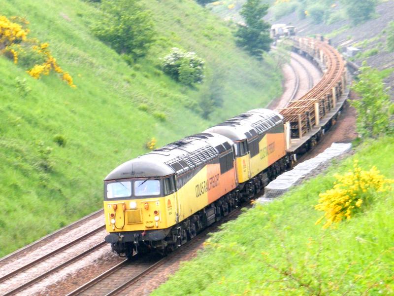 56094 & 56087 @ Gleneagles - 03 June 2018: Powering south, from Inverness to Millerhill, with a full load of long welded rails. Belching diesel fumes, under a thunder threatening sky . Photo of 56094 & 56087 @ Gleneagles - 03 June 2018