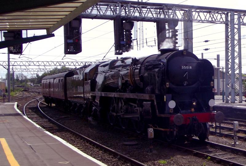 35018 at Carlisle: Ex SR Merchant Navy 35018 British India Lines, heads from Carlisle station to Upperby for turning, coal and water. It then forms the return Cumbrian Mountain Express back to London Euston on Saturday 12th May 2018 Photo of 35018 at Carlisle