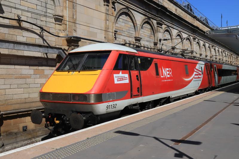 time to change to LNER: 91132 on the 14.50 Edinburgh to KX in plat 9 at Waverley with LNER on the side on 01/07/2018 Photo of time to change to LNER