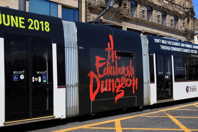 New Vinyl on Tram 276: Edinburgh Dungeon vinyl replacing Jump on the tram for Emily the Sheep & Highland Show ( show finished Sunday photo of new vinyl on Saturday) Photo of New Vinyl on Tram 276