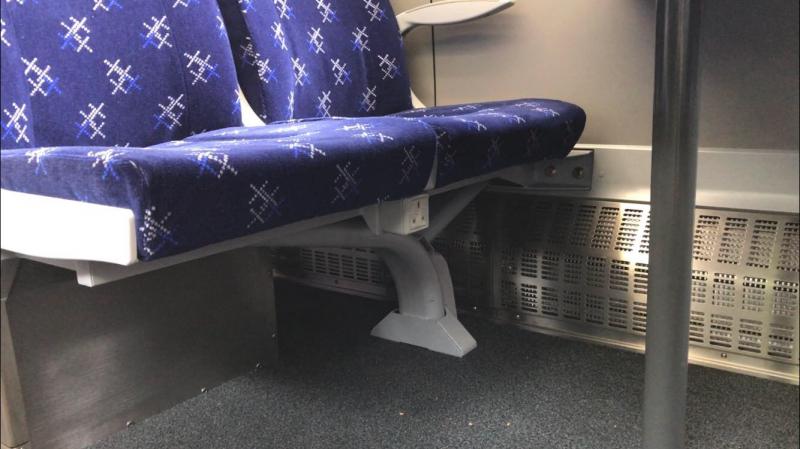 Class 385 power socket: Takes a bit of finding - they are not very obvious. Potential misunderstandings while people fumble to find them. Photo of Class 385 power socket