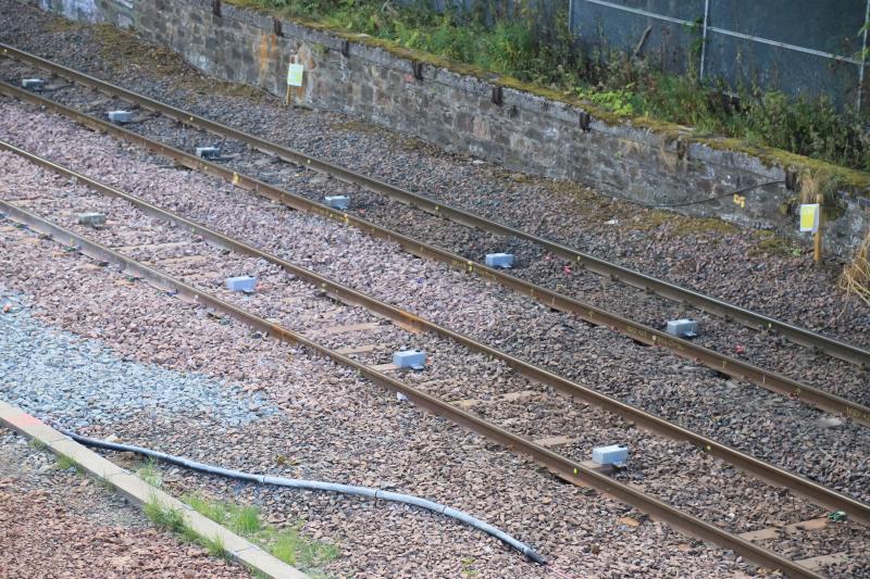 Sensors???: Both tracks past the stabilisation work near Niddrie West Jct have these sensors where there is TSR. Clean ballast laid where the work was done. Photo of Sensors???
