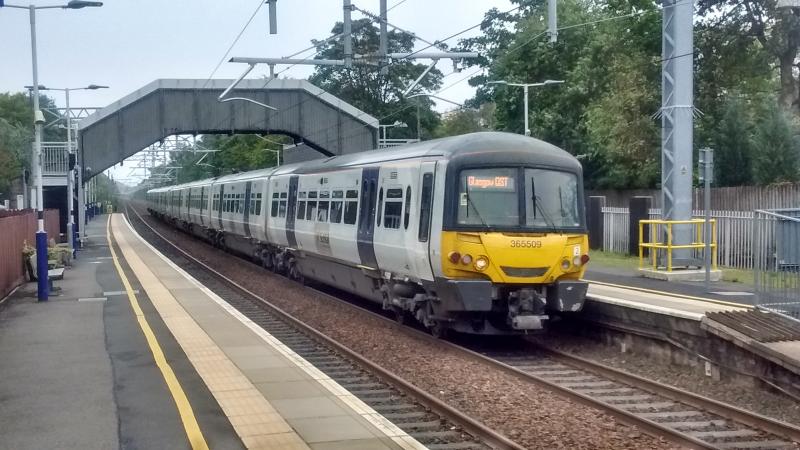 365509 waits at Lenzie station signal: 365509 waits at Lenzie station signal for the E&G trains ahead to clear after Storm Ali related problems. 19 Sept 2018. Photo of 365509 waits at Lenzie station signal