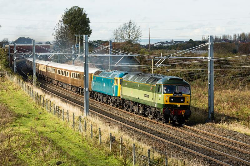 Lathallan in the sun, just.: Two tone green D1924 in front of banger blue 1733 with 1Z26 08:17 Inverness-Milton Keynes Central return excursion. 29 Oct 18. Photo of Lathallan in the sun, just.