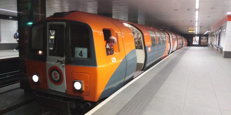 All Aboard: The Driver Makes his check before closing the Doors at St Enoch station. Photo of All Aboard