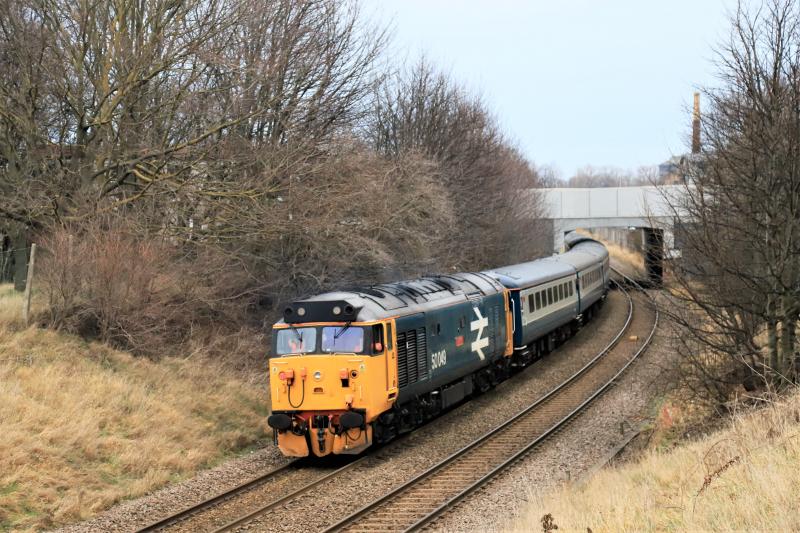 1Z28: 50049 on the rear of 1Z28 04.55 Birmingham New St passing Peffermill playing fields on 05/01/2019 50007 leading Photo of 1Z28