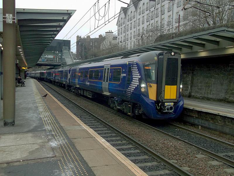 385117 at Haymarket: With many 385s now in service on the Edinburgh to Glasgow Line, 385117 waits at Haymarket with a Glasgow service. Classmate 385013 is on the rear. Photo of 385117 at Haymarket