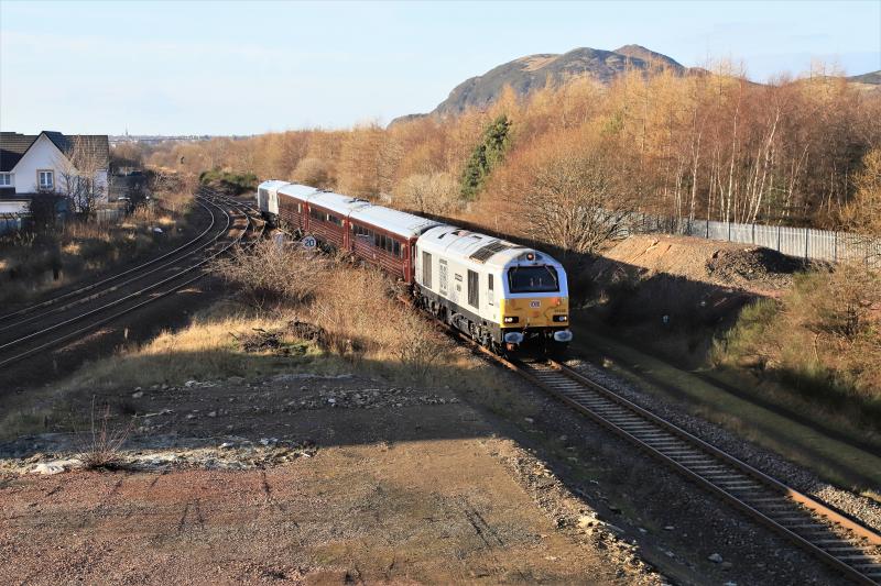 5Z05: 67029 leads the DB company train on 5Z05 12.26 Millerhill to Edinburgh Waverley at Niddrie West Jct on 17/01/2019. Shadows cast by new flats Photo of 5Z05