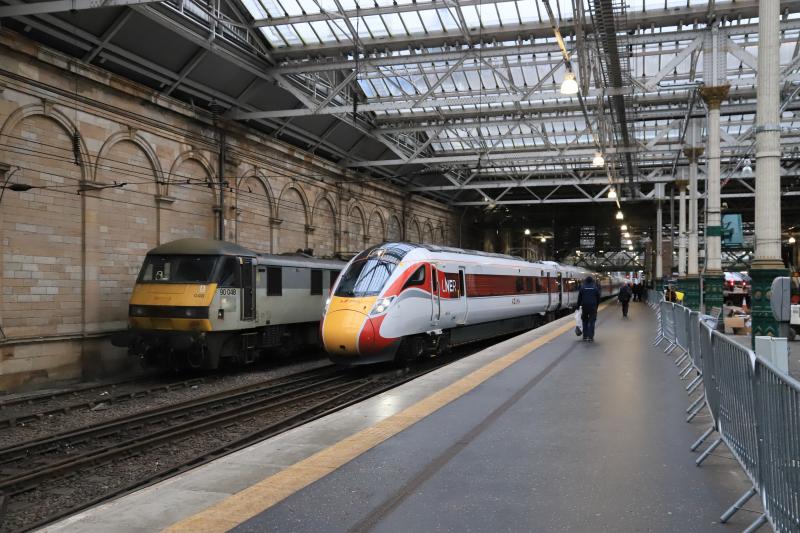 5Q42: 800109 on 5Q42 10.03 Edinburgh to Newcastle leaving Platform 11 Waverley passing 90048 on 09/02/2019. This photo will not be possible once the Platform 10 crossover is commissioned. Photo of 5Q42