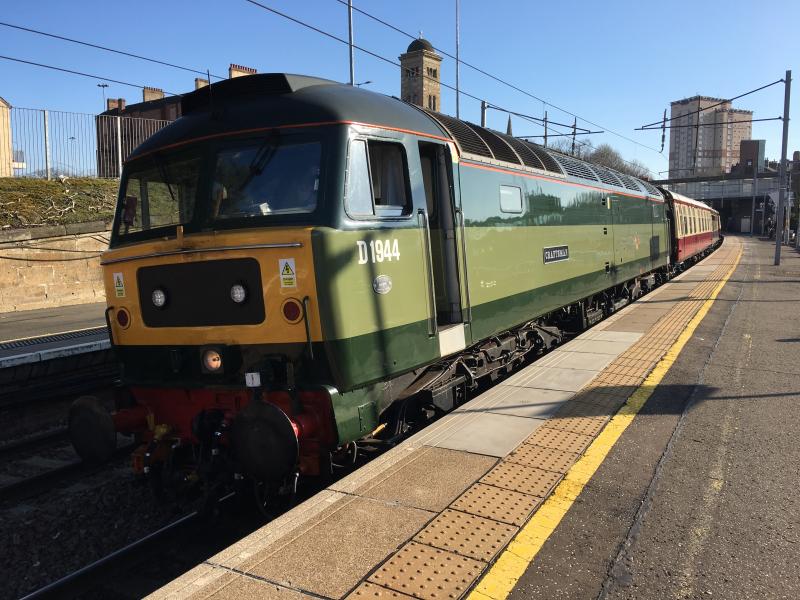 D1994: Working 1Z37 Crewe to Fort Bill, headed by two-tone green 47 no. D1994, pauses at Motherwell for a red. Photo of D1994