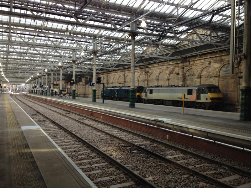 Waverley Platforms 5/6: Barriers around new works removed; view towards Klondyke
with 90044/92018 stabled Photo of Waverley Platforms 5/6