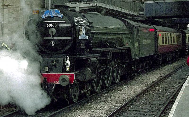 Tornado at Edinburgh: 60163 Tornado has arrived at Edinburgh Waverly with 1Z63 a steam Charter from Doncaster. It took over the train at York for its first outing after its recent problems. Photo of Tornado at Edinburgh