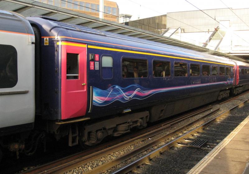 ex-FGW HST trailer coach.: Unrefurbished HST Trailer First, 41136 in the former First Great Western 'neon dynamic lines' livery.
In set HA11, the other coaches were plain blue. Haymarket station. 21/02/2019 Photo of ex-FGW HST trailer coach.