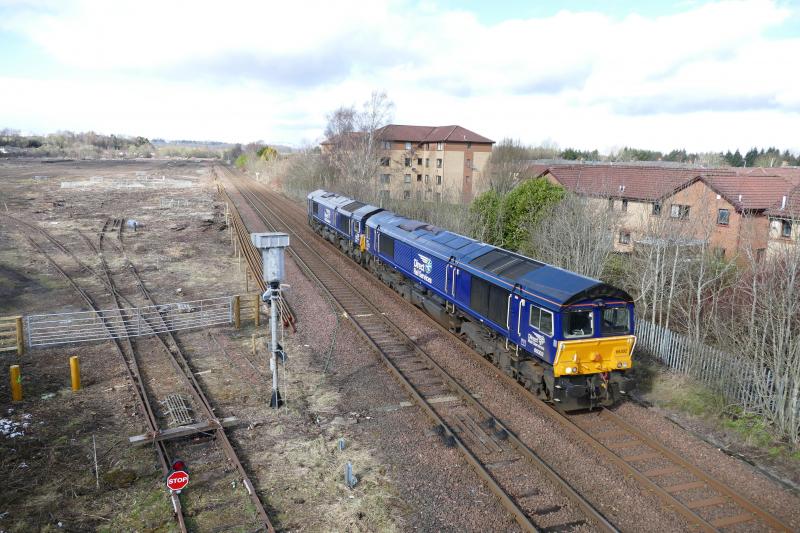 66302 hauling dead 66434 passing Perths old 'New' Yard. : DRS 66434 failed the previous Monday on 4H47. 66302 is towing the errant loco. back to Motherwell passing the site of Perths 'New' Yard. Photo of 66302 hauling dead 66434 passing Perths old 'New' Yard.