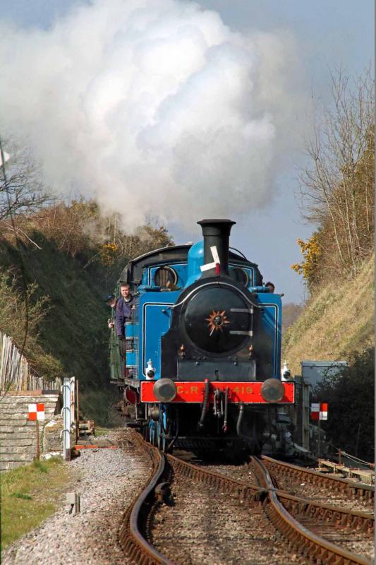 Corfe Castle arrival: 419 enters Corfe Castle station with a down train from Norden. Photo by Andrew P.M. Wright Photo of Corfe Castle arrival