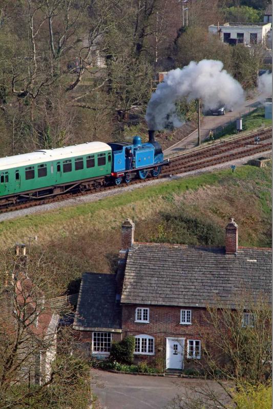 From on high: Viewed from the Castle ramparts 419 enters Corfe station into the up platform. Photo by Andrew P.M. Wright Photo of From on high