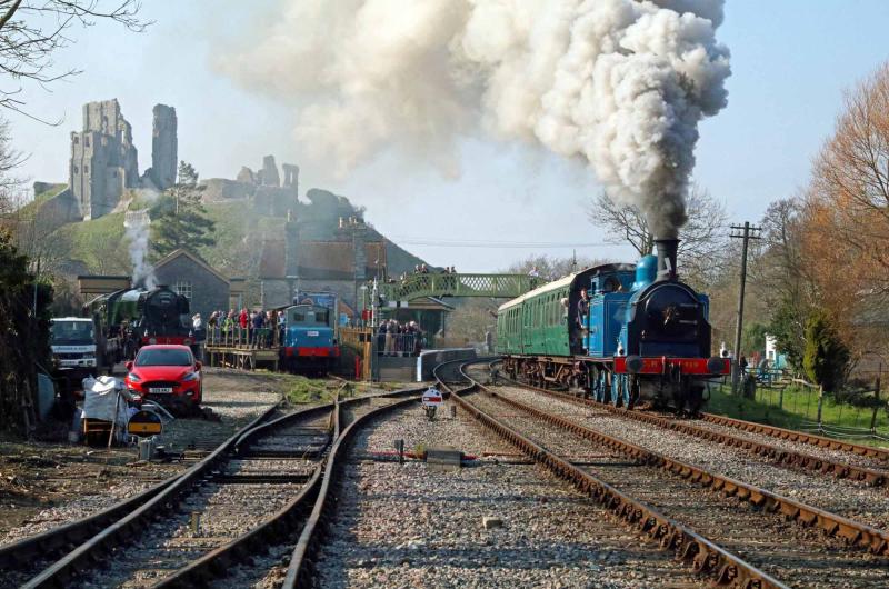 Rousing departure: 419 makes a spirited get away from the level track in the station with a mile of 1 in 80 over Corfe Common ahead of it. Photo by Andrew P.M. Wright Photo of Rousing departure