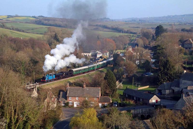 Turn turn turn: 419 has been turned on the 50ft turntable at Swanage shed and pilots National Collection former LSWR T9 30120 away from Corfe Castle to Norden. Photo by Andrew P.M. Wright Photo of Turn turn turn